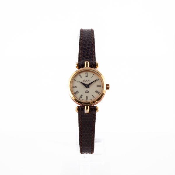 Gucci 4500 - Orologio da polso al quarzo da donna in acciaio, acciaio dorato e smalto