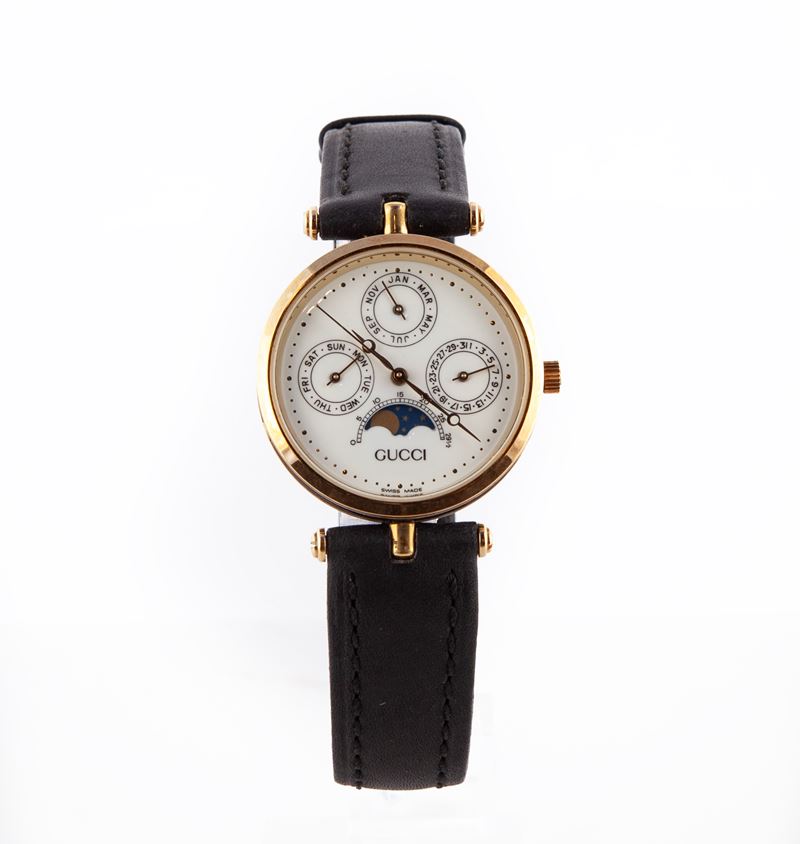 Gucci Santos Moon - Orologio da Polso al Quarzo da Uomo in Acciaio Placcato in Oro Giallo e Smalt...