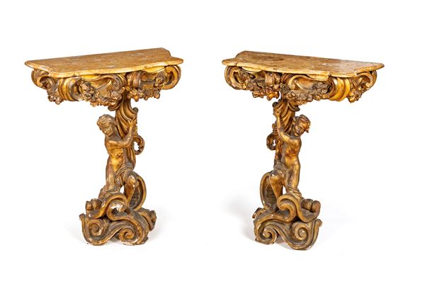 Coppia di consoles in legno scolpito e dorato, XIX secolo