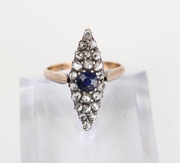 Anello antico a marquise in oro, argento, diamanti e zaffiro