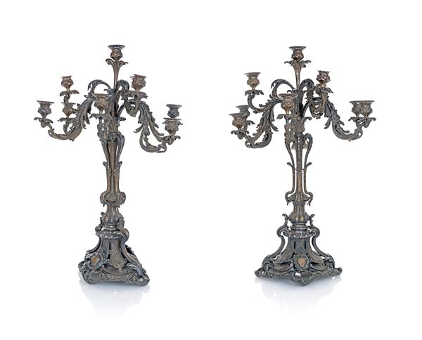 Coppia di grandi candelabri in metallo argentato a otto luci, XIX secolo