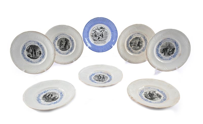 Otto "assiettes parlantes" diversi in ceramica con decoro stampato in nero e blu, Francia, fine d...
