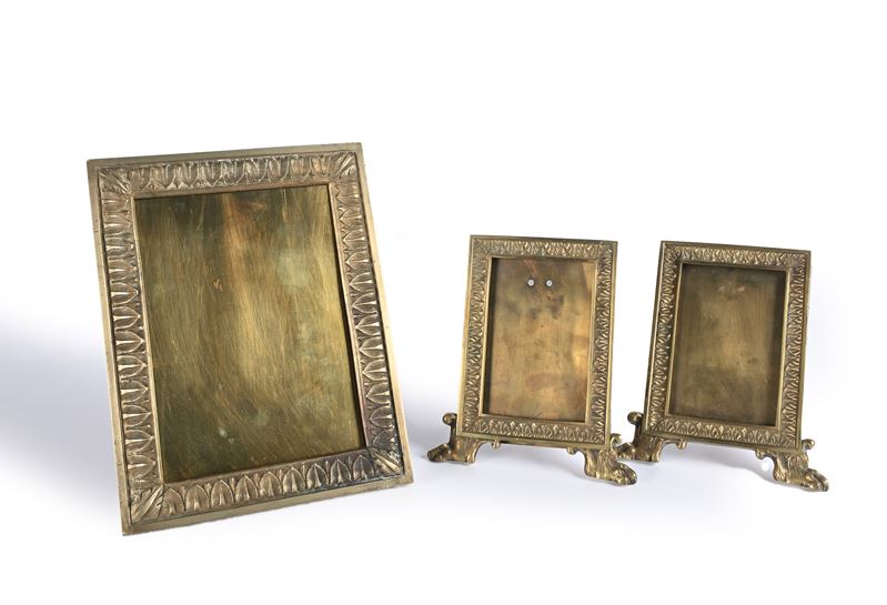 Tre cornici da tavolo in ottone