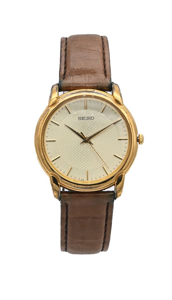 Seiko 7N01 6790 - Orologio da polso al quarzo da uomo in metallo dorato