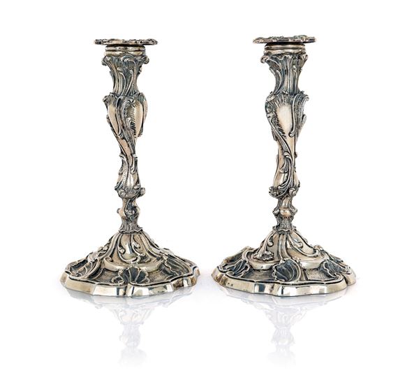 Coppia di candelieri in argento 800/000