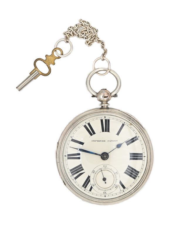 Orologio da tasca con carica a chiavetta da uomo in argento con punzoni Londra 1880. Meccanica a conoide con scappamento ad ancora, bilanciere anulare e spirale piana