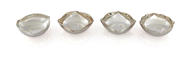 Set di quattro bowls in argento 925/000, forma variabile