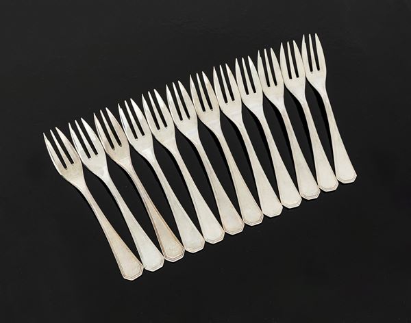 Dodici forchettine da dessert in argento 800/000