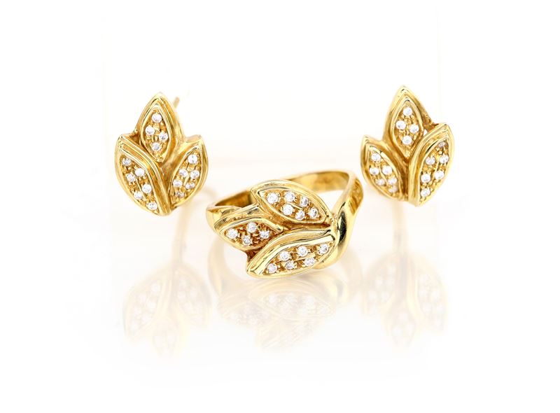 Parure di anello e coppia di orecchini in oro e brillanti