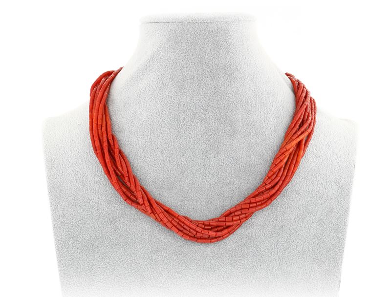 Torchon in corallo e oro