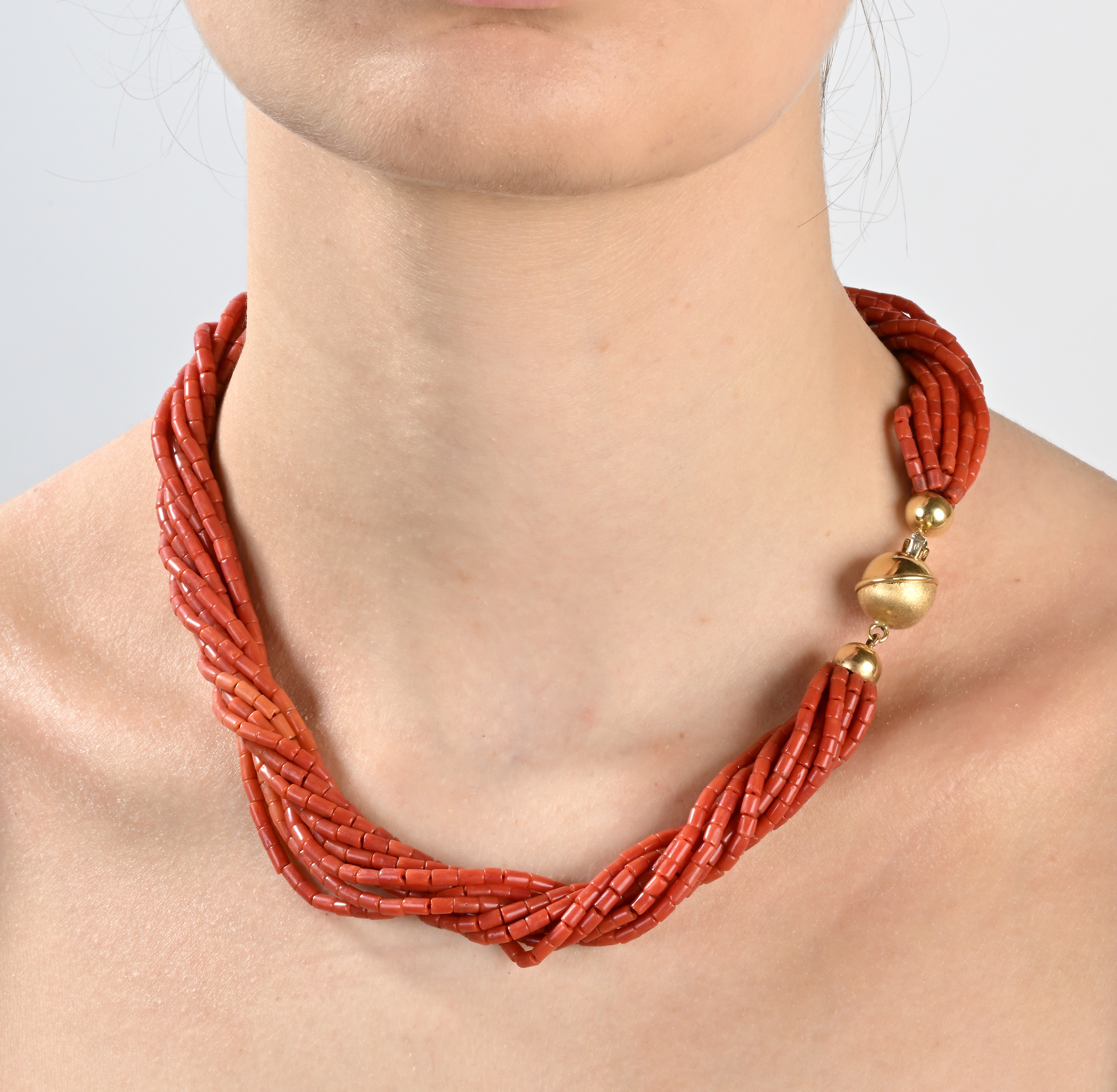 Torchon in corallo e oro