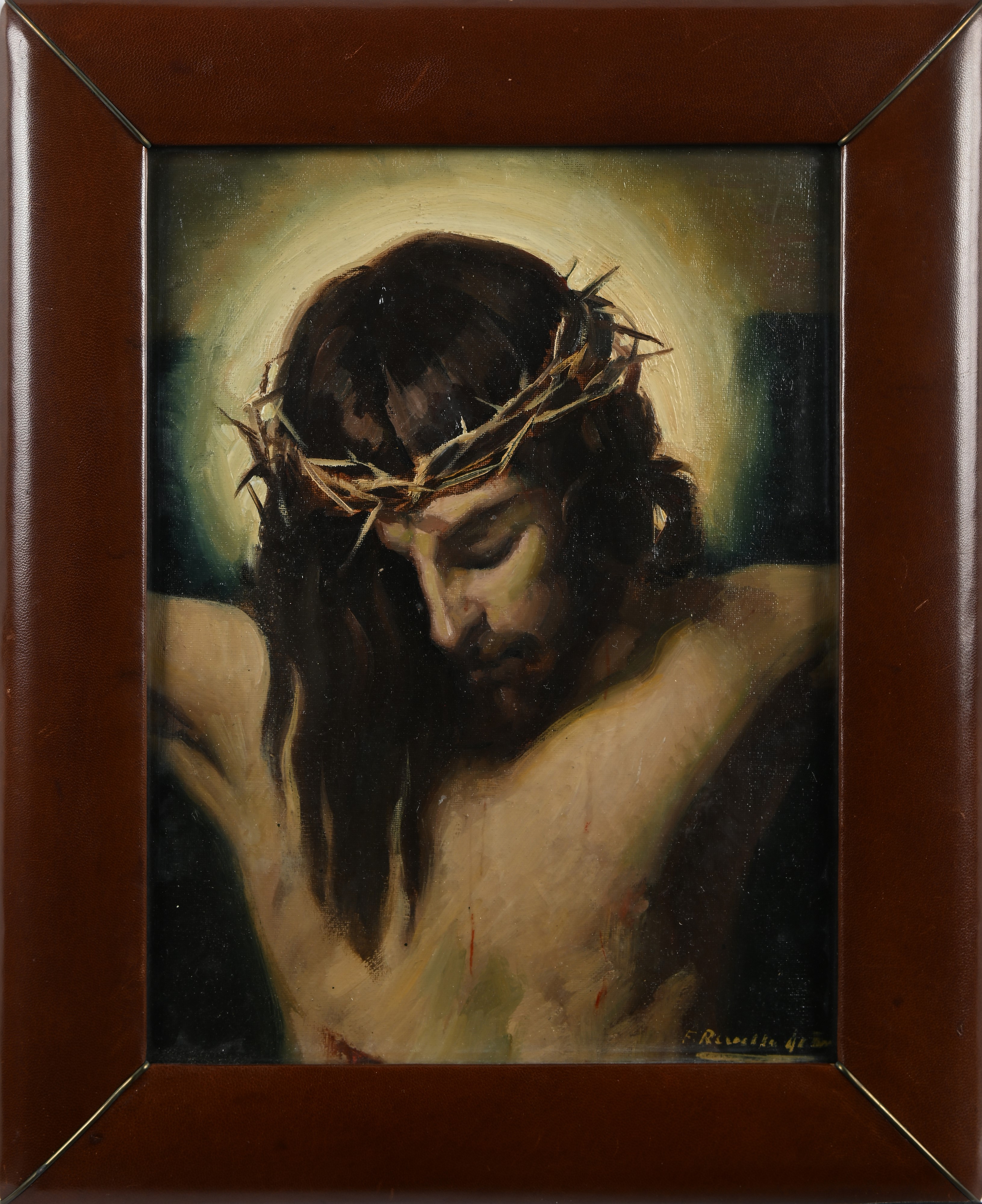 Volto di Cristo entro cornice in cuoio