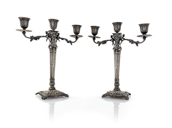 Coppia di candelabri a tre luci