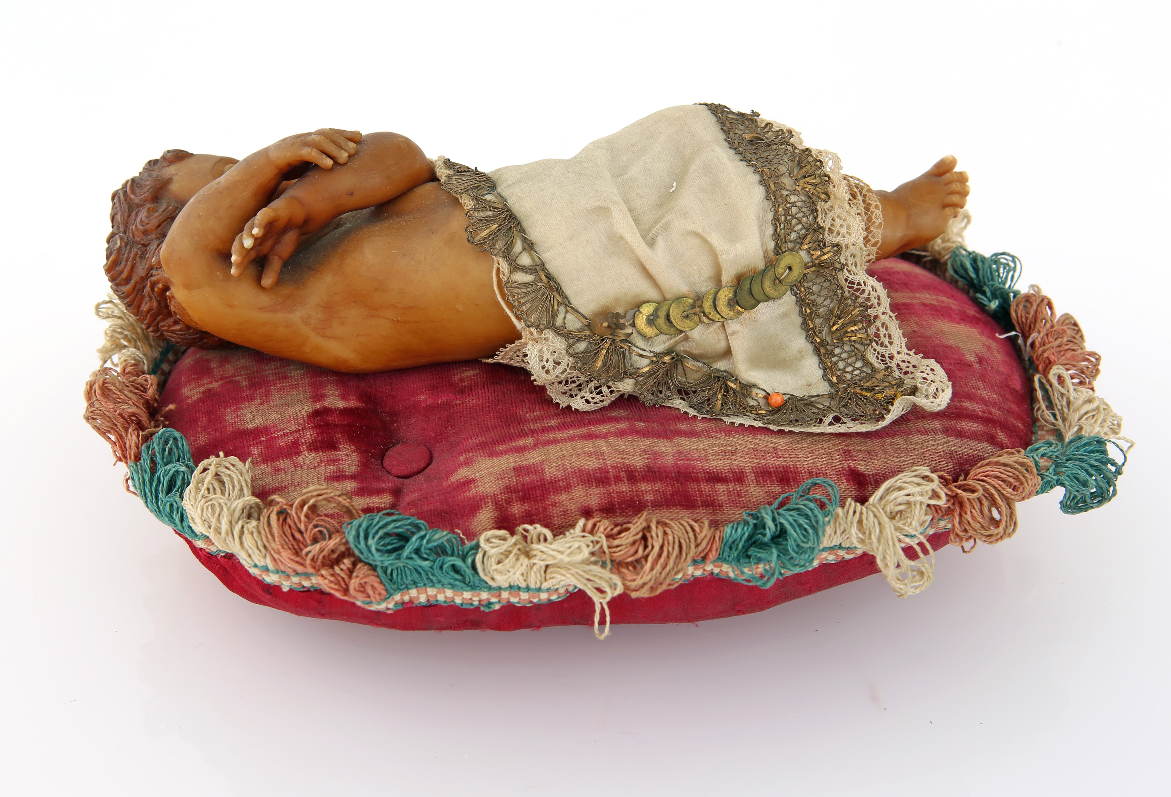 Bambinello dormiente in cera