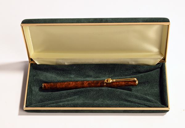 Gucci - Roller in metallo dorato e smaltato finto legno 