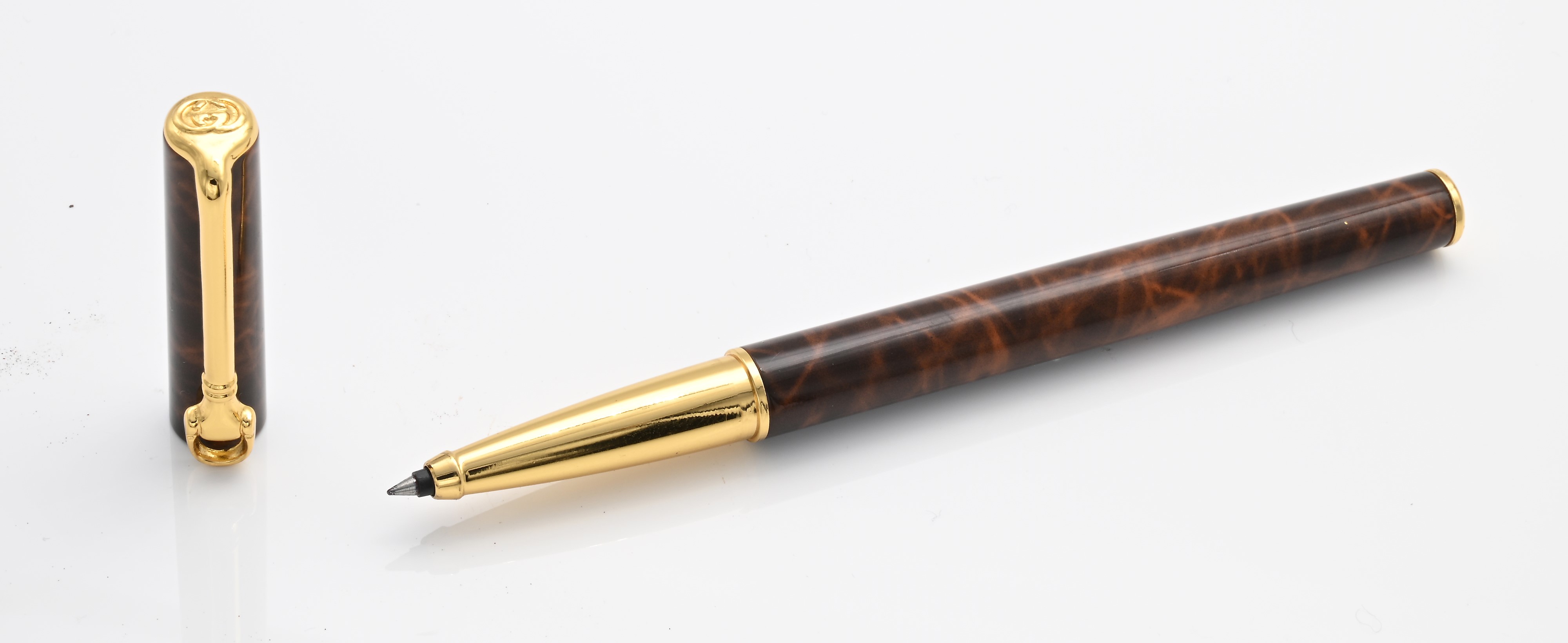 Gucci - Roller in Metallo Dorato e Smaltato Finto Legno