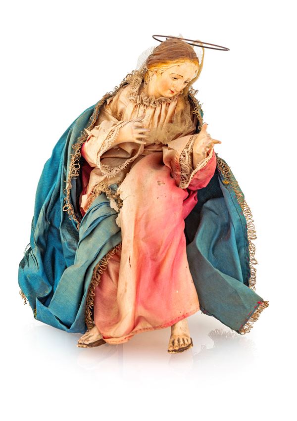 Madonna assisa