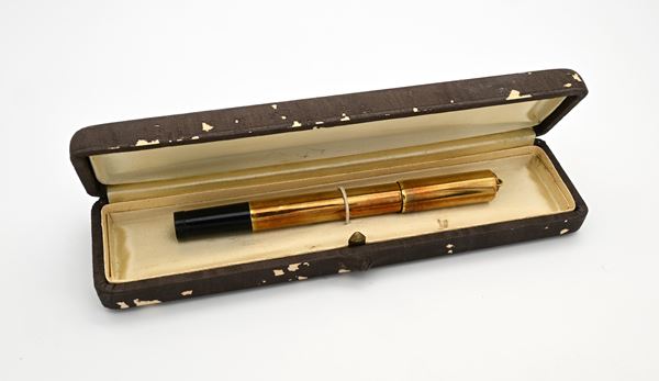 Nettuno 501 - Penna stilografica retrattile in ebanite rivestita di metallo laminato in oro giallo 18 Kt