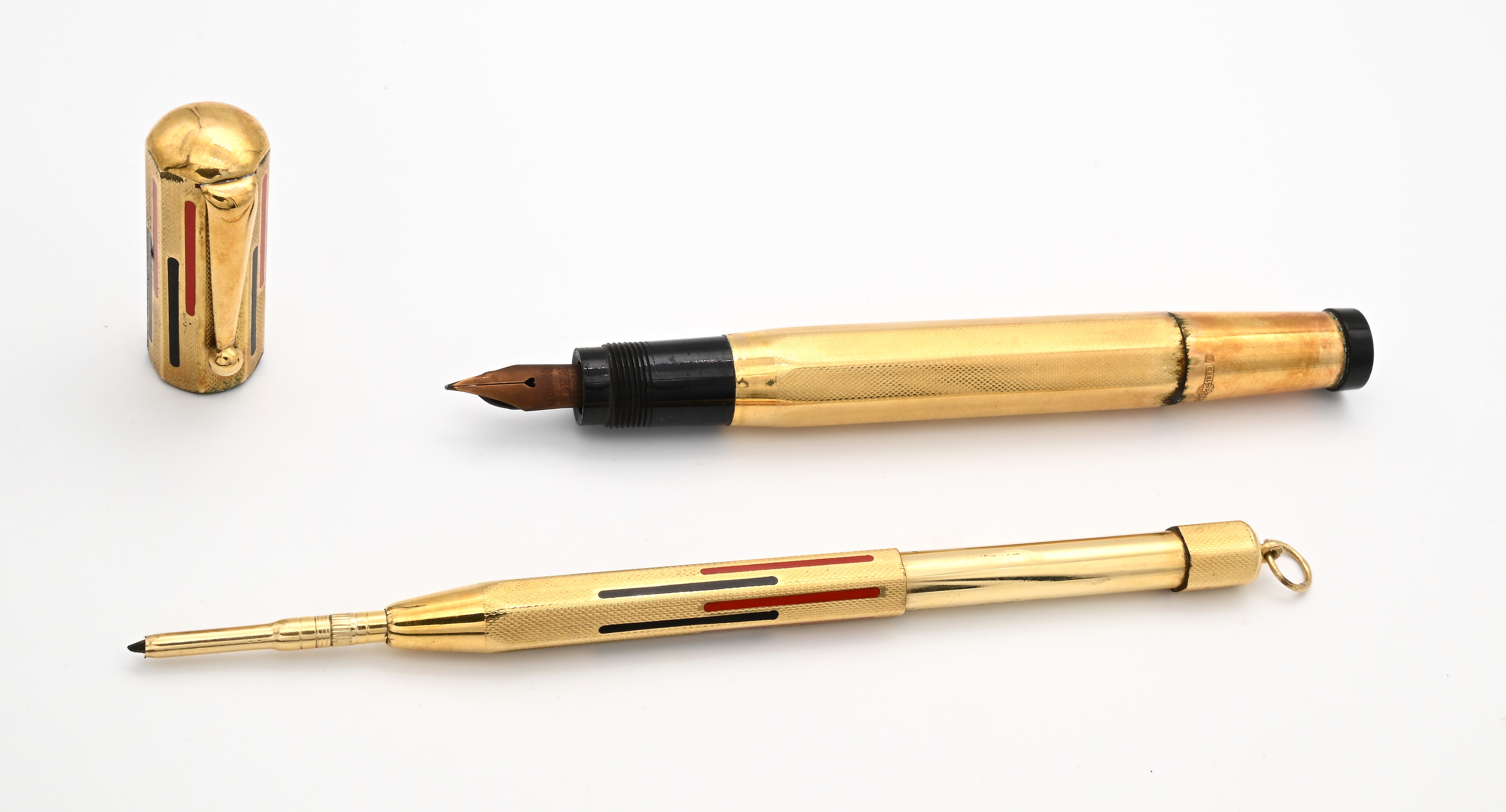 Waterman, Penna stilografica retrattile Ideal 42 in oro 18 Kt con smalti geometrici, anni '20