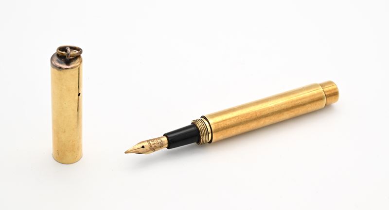 Penna stilografica telescopica in metallo placcato in oro giallo