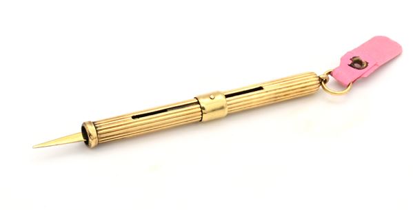 Piccolo specillo vintage in metallo placcato in oro giallo