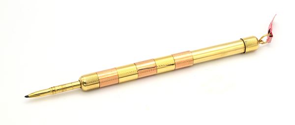 Portamine telescopico vintage in metallo placcato oro giallo e rosa con incisioni geometriche