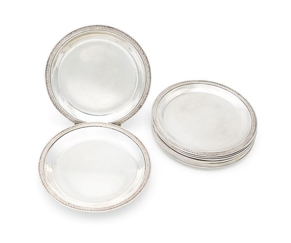 Dodici piattini da pane in argento 800/000, Frugoni