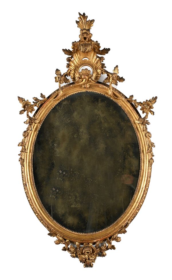 Specchiera ovale in legno dorato, Napoli XVIII secolo