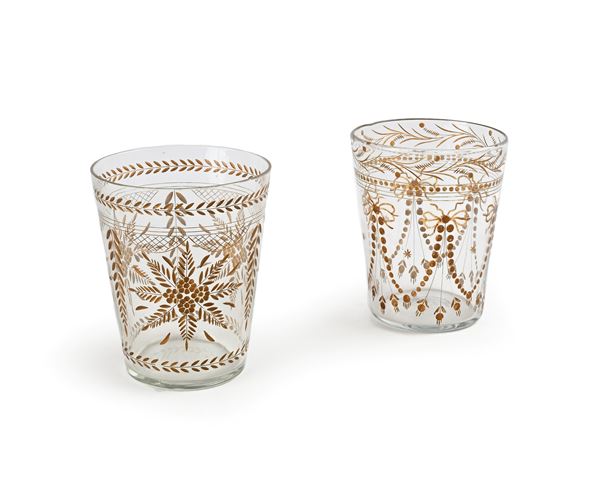 Due rinfrescatoi simili in vetro con decorazione molata e dorata, inizi XX secolo