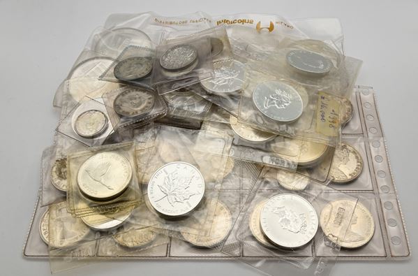 Lotto Canada: 4 monete da 10 Dollari; 18 monete da 5 Dollari; 22 monete da 1 Dollaro; 10 Mezzi dollari e 3 monete da 25 Cts Canada