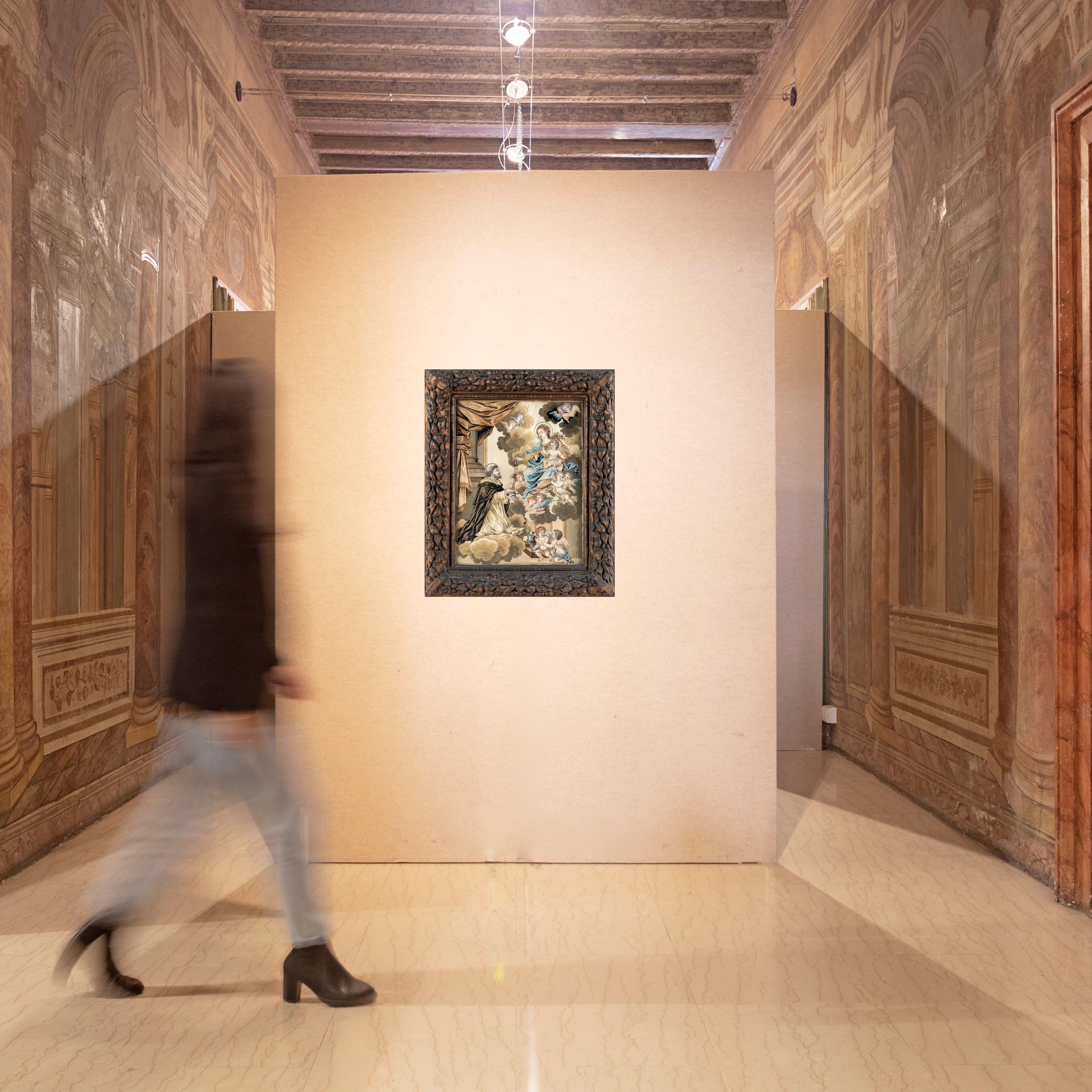 La Vergine col Bambino consegna il rosario a San Domenico