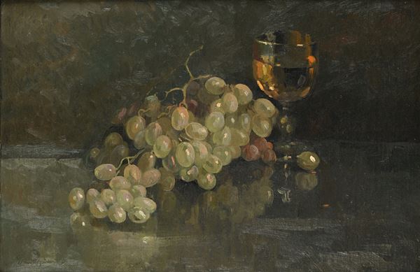 Natura morta con uva e calice di vino bianco