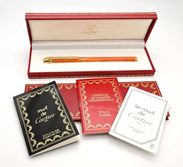 Cartier Must de - Penna stilografica in metallo placcato in oro e smalto marmorizzato arancione