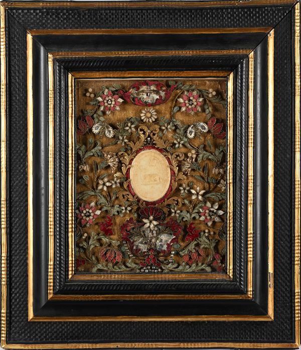 Agnus Dei in cera con cornice in legno ebanizzato, intagliato e dorato, XVIII/XIX secolo