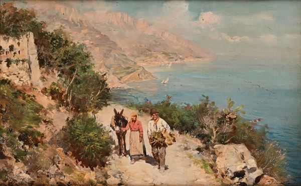 Coppia di contadini su una strada lungo la costiera 