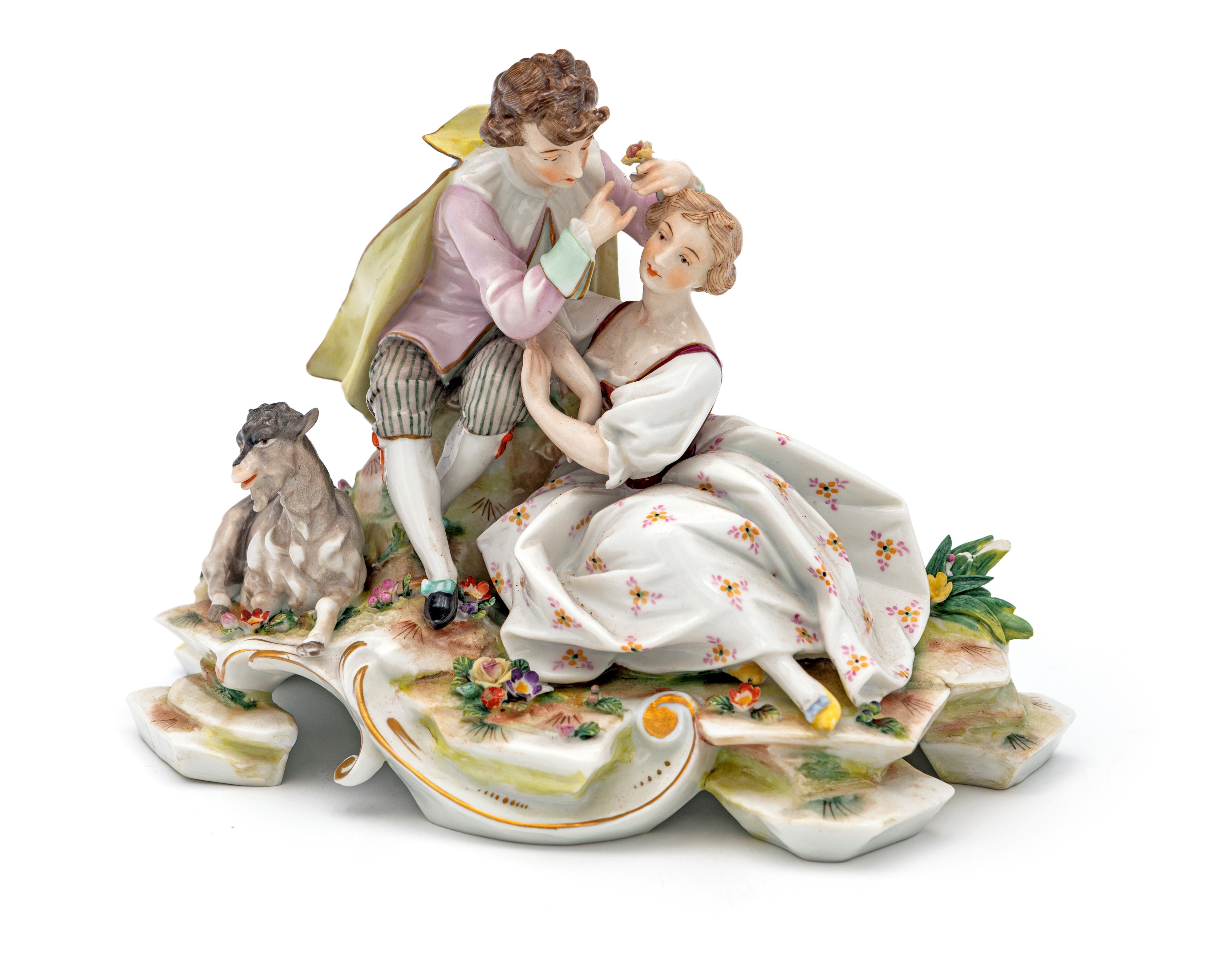 Tre gruppi in porcellana policroma, XX secolo, cofanetto espositore in pelle