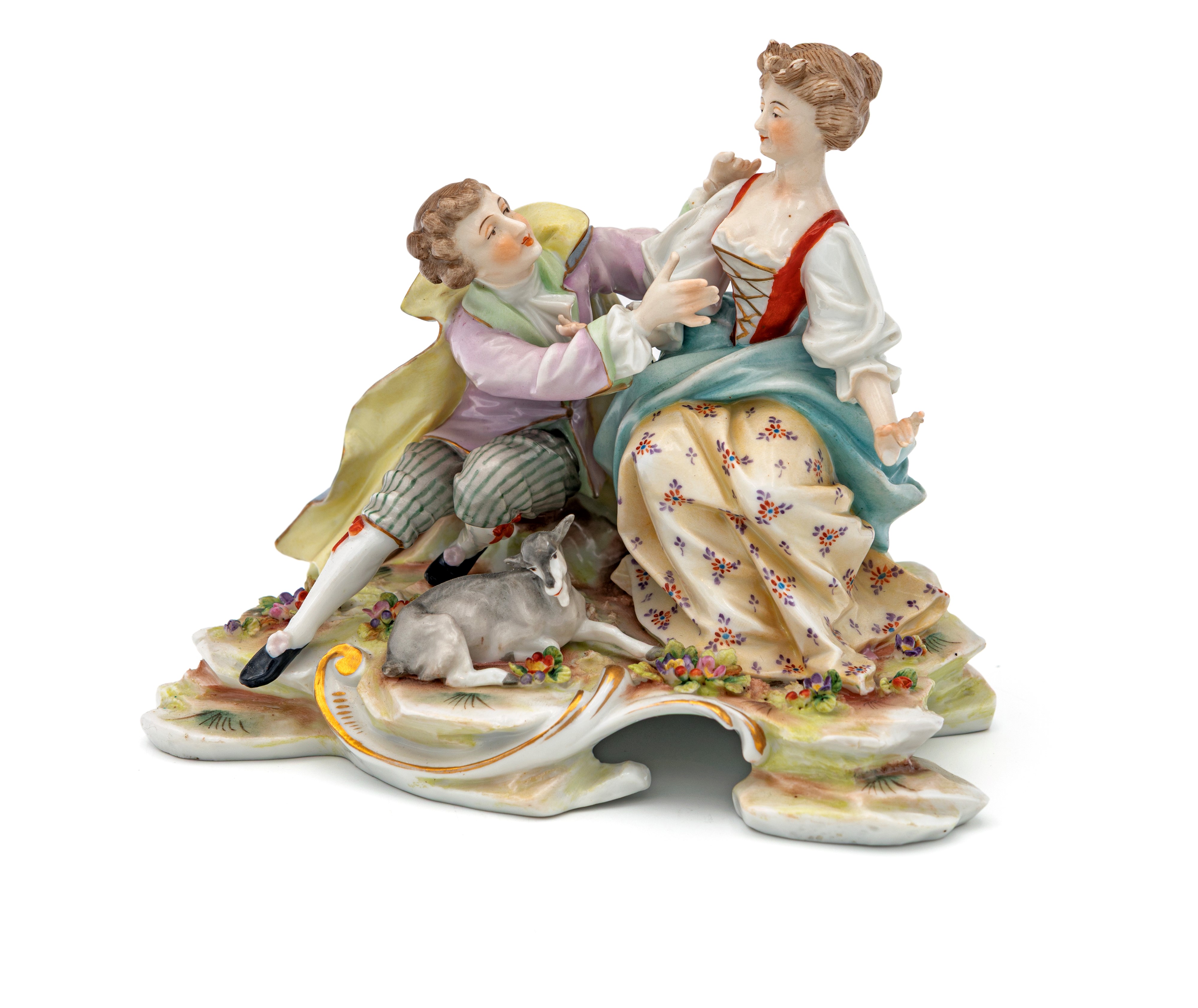 Tre gruppi in porcellana policroma, XX secolo, cofanetto espositore in pelle