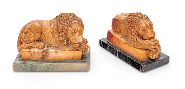 Due piccoli leoni canoviani in marmo giallo di Siena, XVIII secolo
