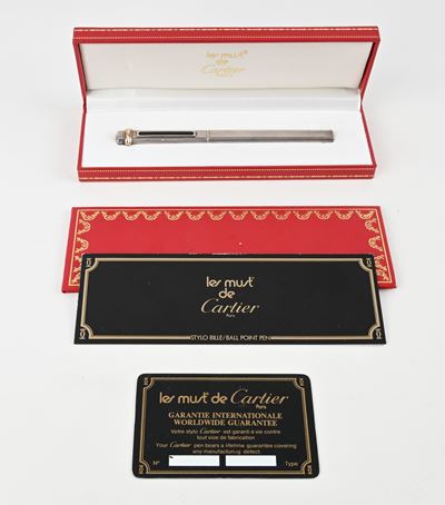 Cartier, Must de - Penna a sfera in metallo argentato e dorato con smalto