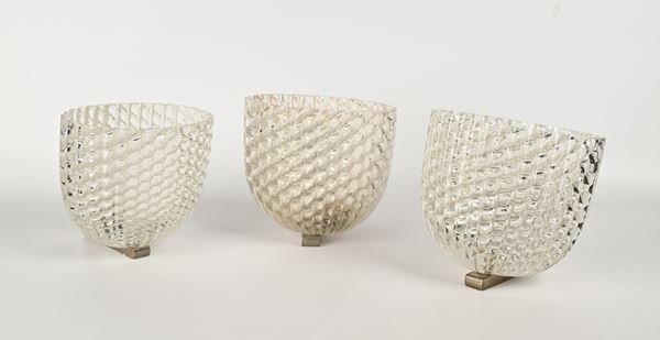 Tre apliques in vetro incolore