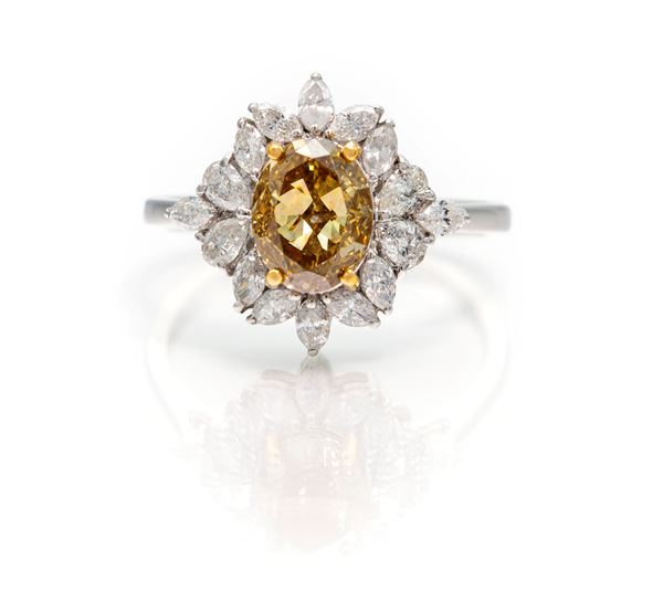 Anello in oro, diamante fancy e brillanti