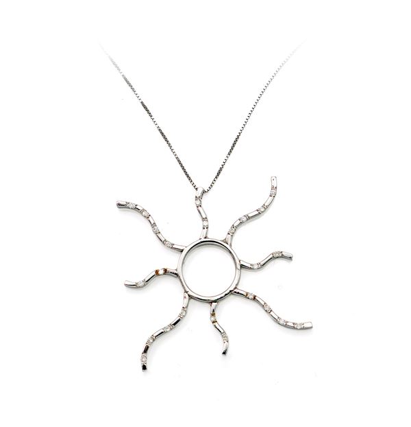 Pendente a sole in oro e brillanti