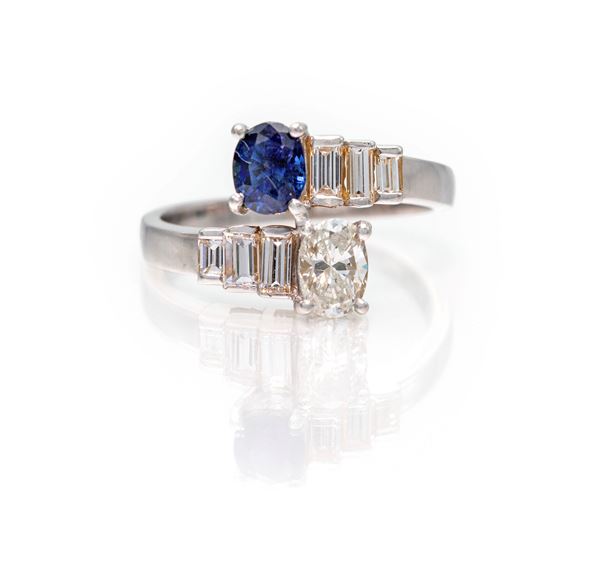 Anello a contrariè in oro, diamanti e zaffiri