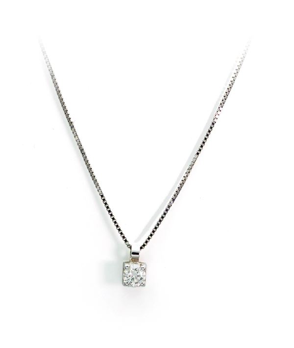 Pendente punto luce in oro e brillante