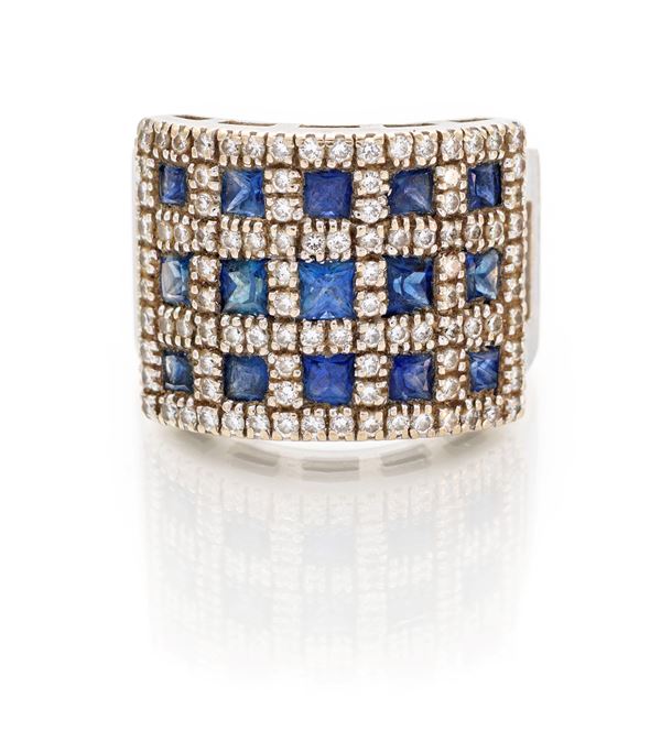 Anello a fascia in oro e zaffiri