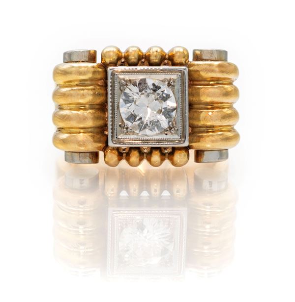 Anello in oro e brillante solitario