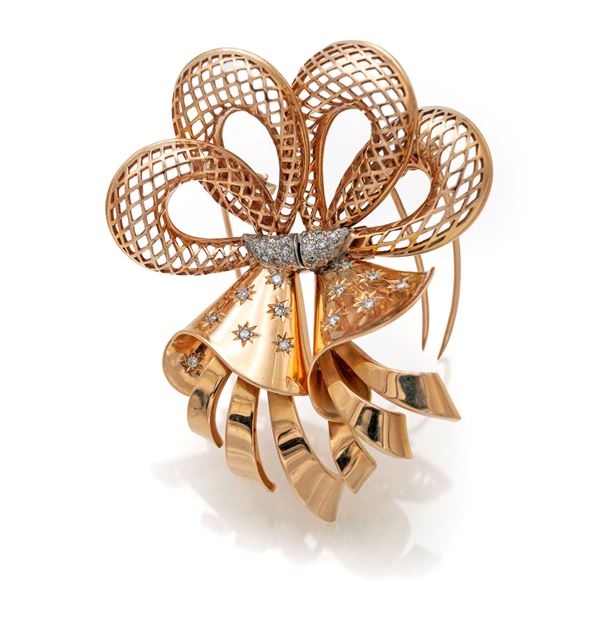 Spilla doppia clip in oro e brillanti