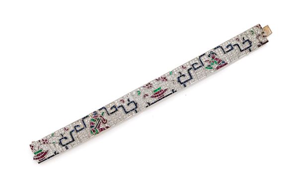 Bracciale Egyptian revival in oro, brillanti, zaffiri, smeraldi e rubini