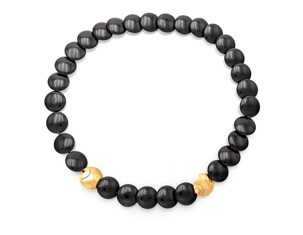 Tiffany, collana in oro e onici