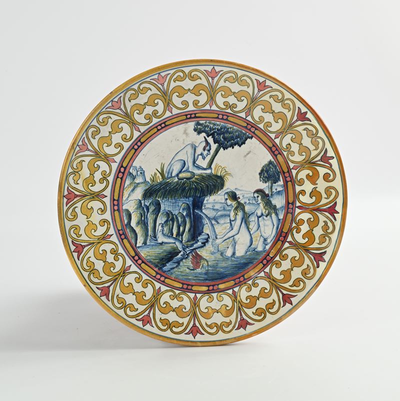 Piatto in maiolica bianca e blu e a lustro, XX secolo
